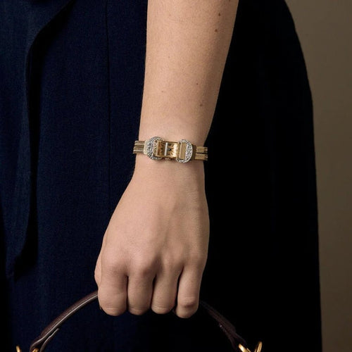 Montre Montre dame années 40 en or jaune 18K et diamants 58 Facettes