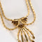Collier Collier vintage années 50 en or jaune 750 et diamants 58 Facettes