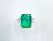 Bague 52 Bague émeraude en or blanc et diamants trapèzes 58 Facettes