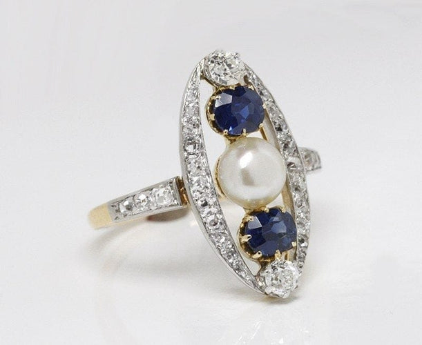 Bague 55 Bague marquise Belle Époque en or et platine, diamants, saphirs et perle fine 58 Facettes