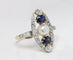 Bague 55 Bague marquise Belle Époque en or et platine, diamants, saphirs et perle fine 58 Facettes