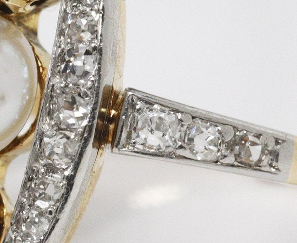 Bague 55 Bague marquise Belle Époque en or et platine, diamants, saphirs et perle fine 58 Facettes
