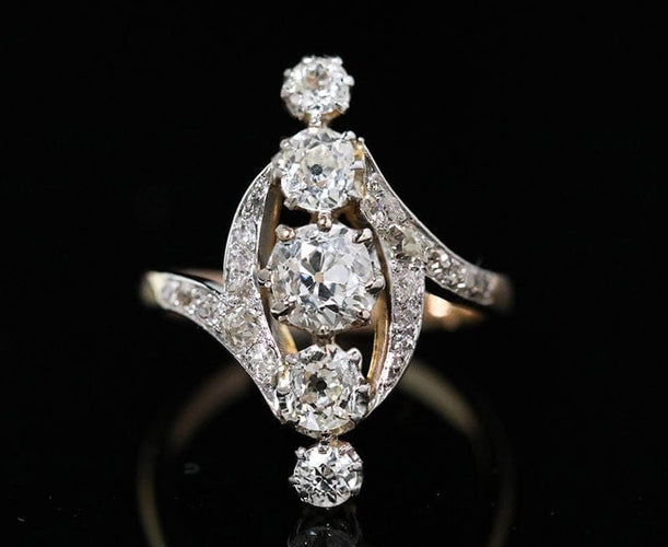 Bague 49 Bague Belle Époque marquise en or, platine et diamants 58 Facettes