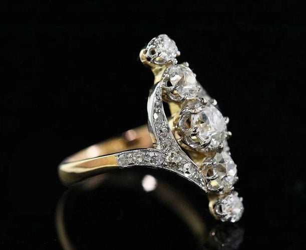 Bague 49 Bague Belle Époque marquise en or, platine et diamants 58 Facettes