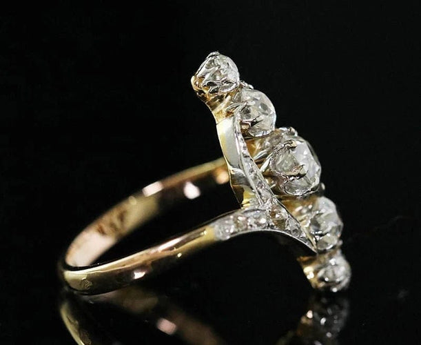 Bague 49 Bague Belle Époque marquise en or, platine et diamants 58 Facettes