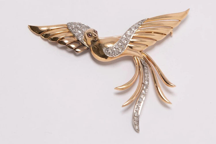 Broche Broche en or jaune et blanc 18 carats sertie de diamants 58 Facettes