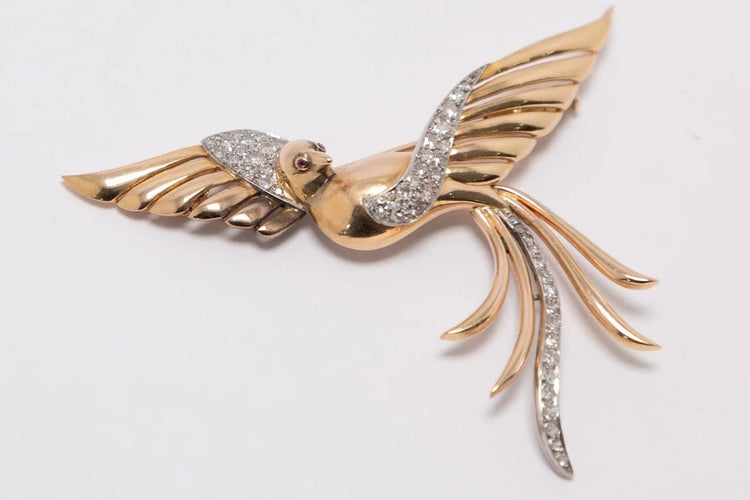 Broche Broche en or jaune et blanc 18 carats sertie de diamants 58 Facettes