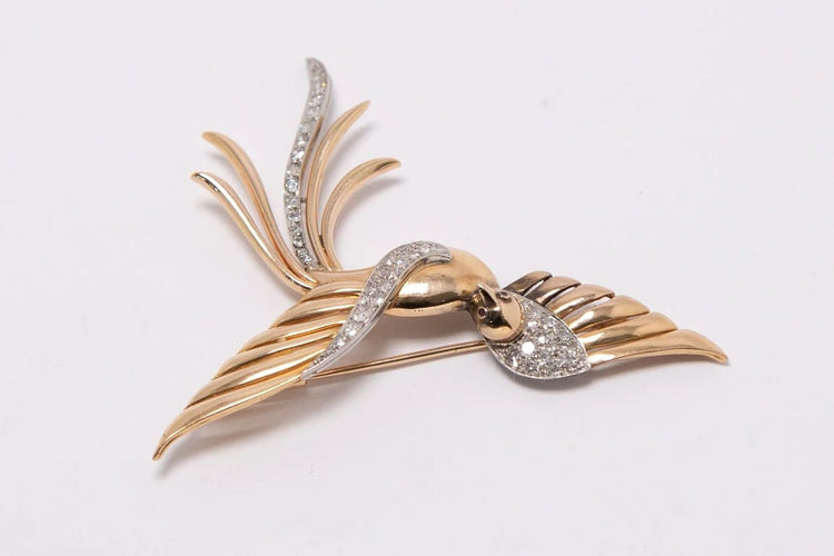 Broche Broche en or jaune et blanc 18 carats sertie de diamants 58 Facettes