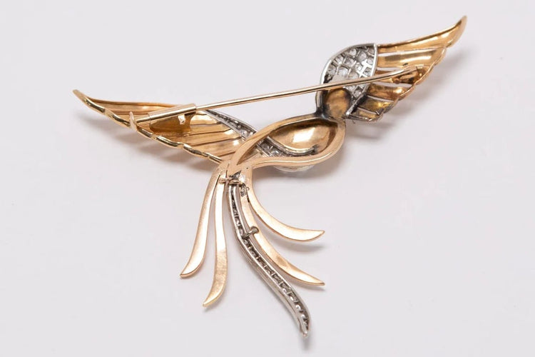 Broche Broche en or jaune et blanc 18 carats sertie de diamants 58 Facettes