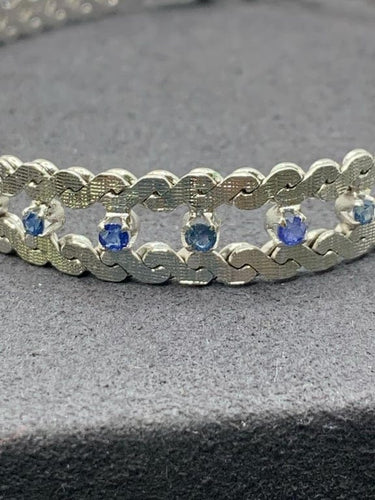 Bracelet Bracelet vintage en or blanc 18 carats et saphirs bleus 58 Facettes