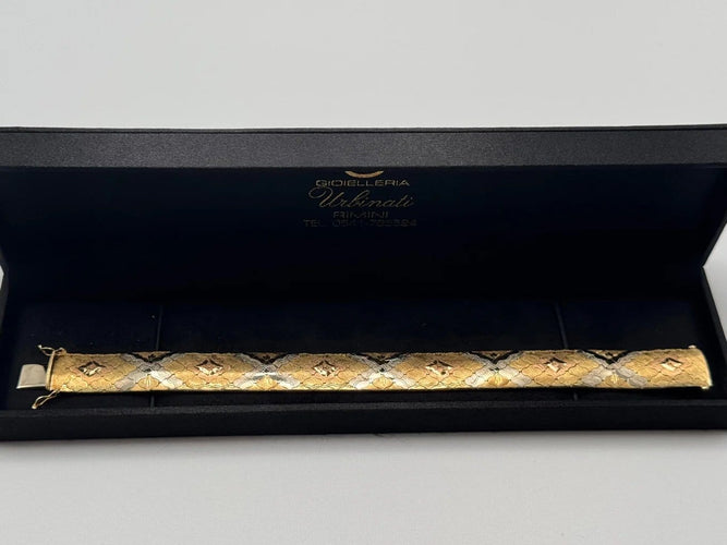 Bracelet Bracelet tapis vintage en or 18 carats tricolore 58 Facettes