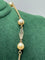 Collier Collier en or jaune 18 carats et perles naturelles 58 Facettes