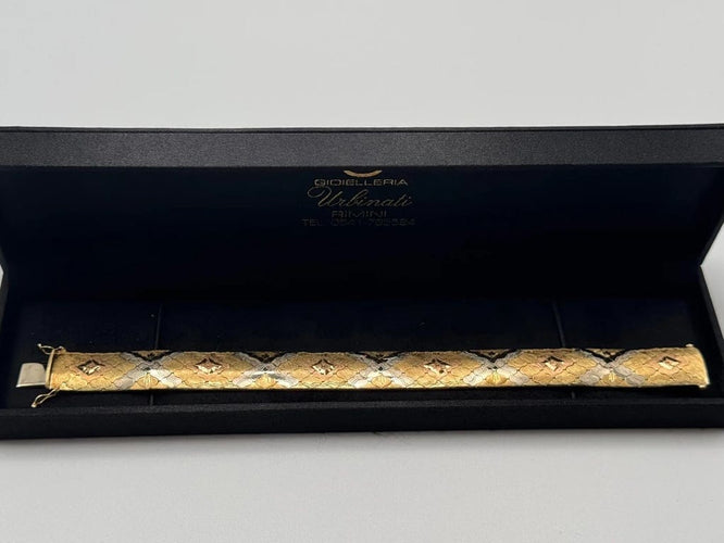 Bracelet Bracelet vintage type tapis en or 18 carats tricolore 58 Facettes