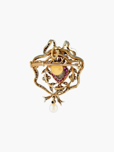 Pendentif Broche pendentif cœur style Louis XVI en or jaune 18k, platine, diamants et rubis 58 Facettes 1547