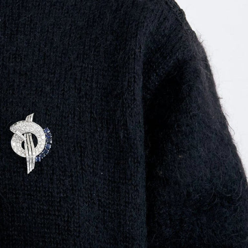 Broche Broche mouvementée en platine 950, saphirs et diamants 58 Facettes YD6