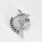 Broche Broche mouvementée en platine 950, saphirs et diamants 58 Facettes YD6