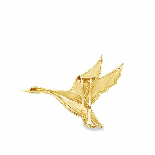 Broche Hermès - Broche Canard en vol en or jaune 18 carats et émeraude 58 Facettes