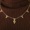 Collier Collier draperie en or jaune 750 avec rubis et diamants 58 Facettes