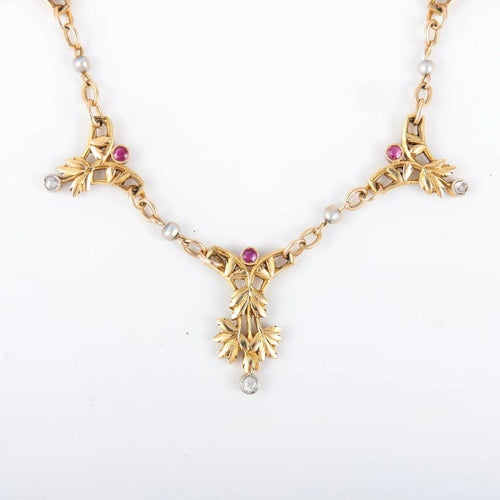 Collier Collier draperie en or jaune 750 avec rubis et diamants 58 Facettes
