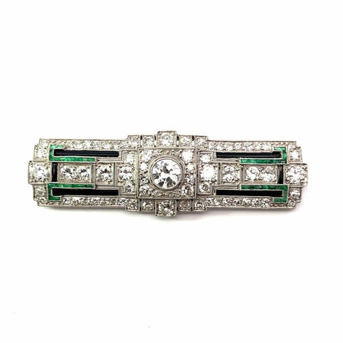 Broche Broche Art déco en platine avec diamants, émeraudes et onyx 58 Facettes
