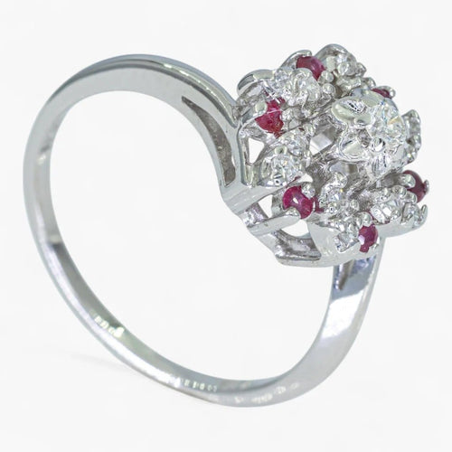 Bague Bague en or 14 carats avec diamant 0,18 ct et rubis 0,06 ct 58 Facettes AN86