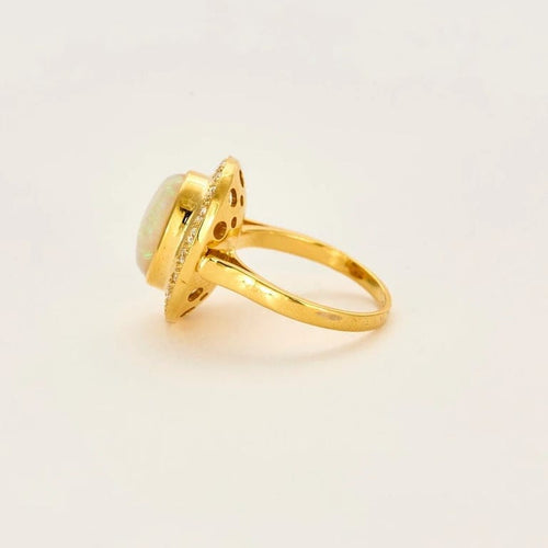 Bague 54 Bague en or jaune 18 carats à opale et diamants 58 Facettes