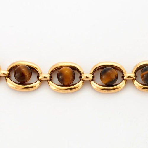 Bracelet Boucheron - Bracelet vintage en or jaune et œil de tigre 58 Facettes