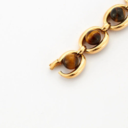 Bracelet Boucheron - Bracelet vintage en or jaune et œil de tigre 58 Facettes