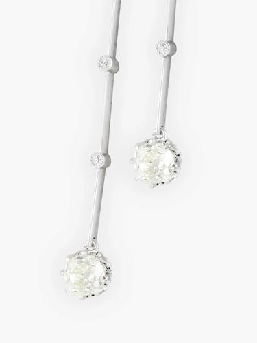 Collier Collier négligé en or blanc et diamants 58 Facettes