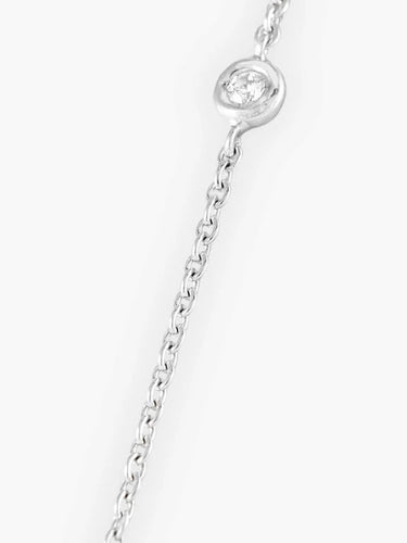 Collier Collier négligé en or blanc et diamants 58 Facettes