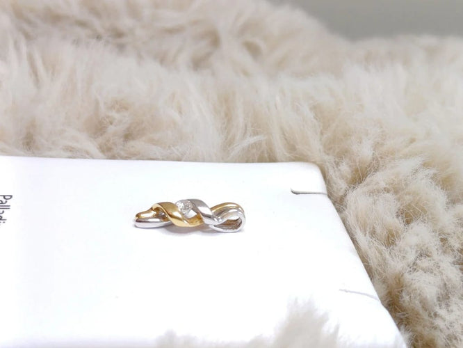 Pendentif Pendentif en or jaune et or blanc 18 carats avec diamant 58 Facettes