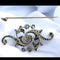 Broche Broche ancienne en or jaune 18 carats et diamants taille ancienne 58 Facettes