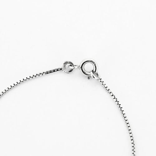 Collier 44cm Chaîne avec pendentif rotatif en or blanc 18 carats et diamants 58 Facettes 58_f60