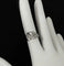 Bague 51 Dinh Van Menottes R12 - Bague en or blanc 18 carats et diamants 58 Facettes