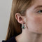 Boucles d'oreilles Art déco - Boucles d’oreilles en platine, émeraudes, diamants et onyx 58 Facettes