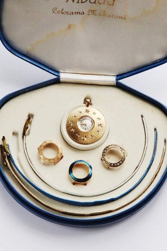 Montre Nivada - Coffret de montre vintage plaqué or avec pendentif 58 Facettes