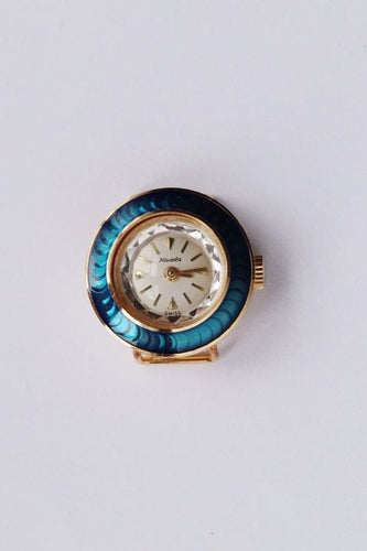Montre Nivada - Coffret de montre vintage plaqué or avec pendentif 58 Facettes