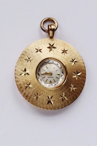 Montre Nivada - Coffret de montre vintage plaqué or avec pendentif 58 Facettes