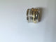 Bague 54 Pomellato Tubolare - Bague godronnée en or jaune et or blanc diamants 58 Facettes