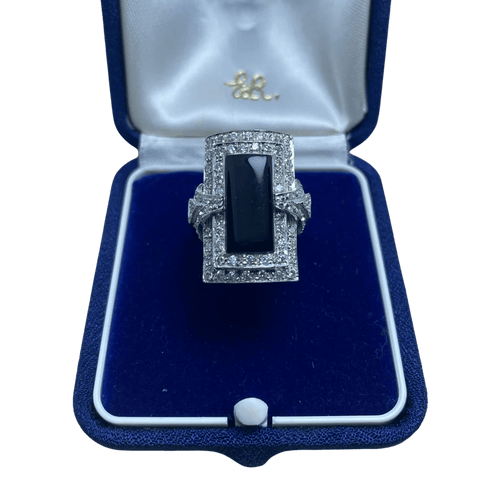 Bague 57 Bague en or blanc 14 kt avec diamants et onyx 58 Facettes
