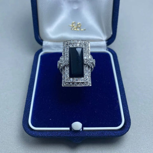 Bague 57 Bague en or blanc 14 kt avec diamants et onyx 58 Facettes
