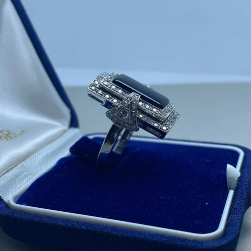 Bague 57 Bague en or blanc 14 kt avec diamants et onyx 58 Facettes