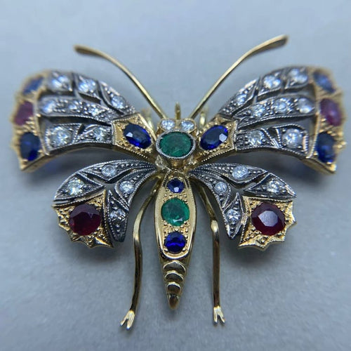 Broche Broche en or jaune 14 ct, argent, diamants et pierres de couleur 58 Facettes
