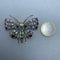 Broche Broche en or jaune 14 ct, argent, diamants et pierres de couleur 58 Facettes