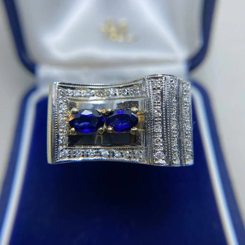 Bague 56 Bague en or 14 kt avec diamants et saphirs 58 Facettes
