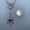 Collier Collier en or jaune 14 carats, argent, diamants et rubis 58 Facettes