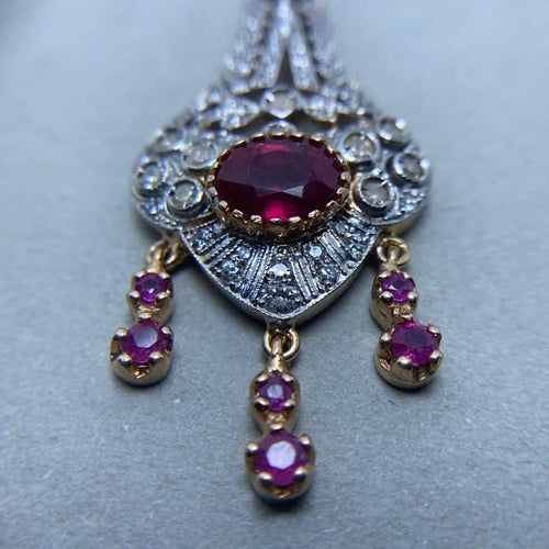 Collier Collier en or jaune 14 carats, argent, diamants et rubis 58 Facettes
