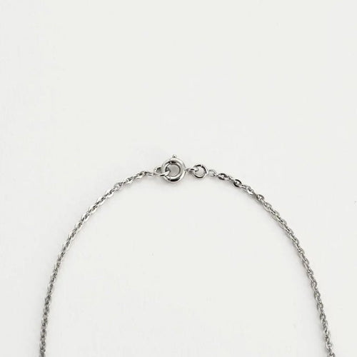 Collier Collier en or blanc 18 carats avec rubis, émeraudes et diamants 58 Facettes 1056180