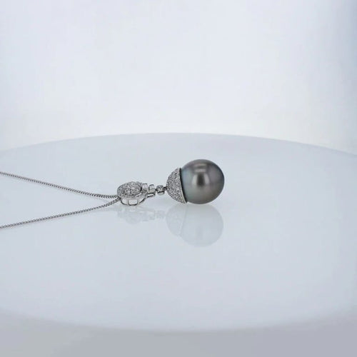 Pendentif Pendentif en or blanc 18k avec perle de Tahiti et diamants 58 Facettes 001.41424