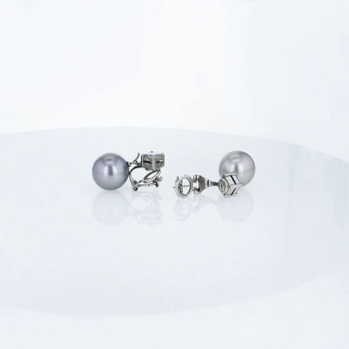 Boucles d'oreilles Boucles d'oreilles à clip en or blanc 18k avec perles de Tahiti et diamants 58 Facettes 001.41426